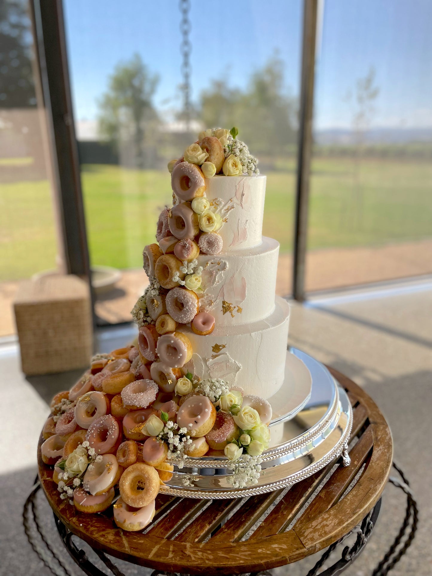 3 Tier Buttercream with Cascading Donuts