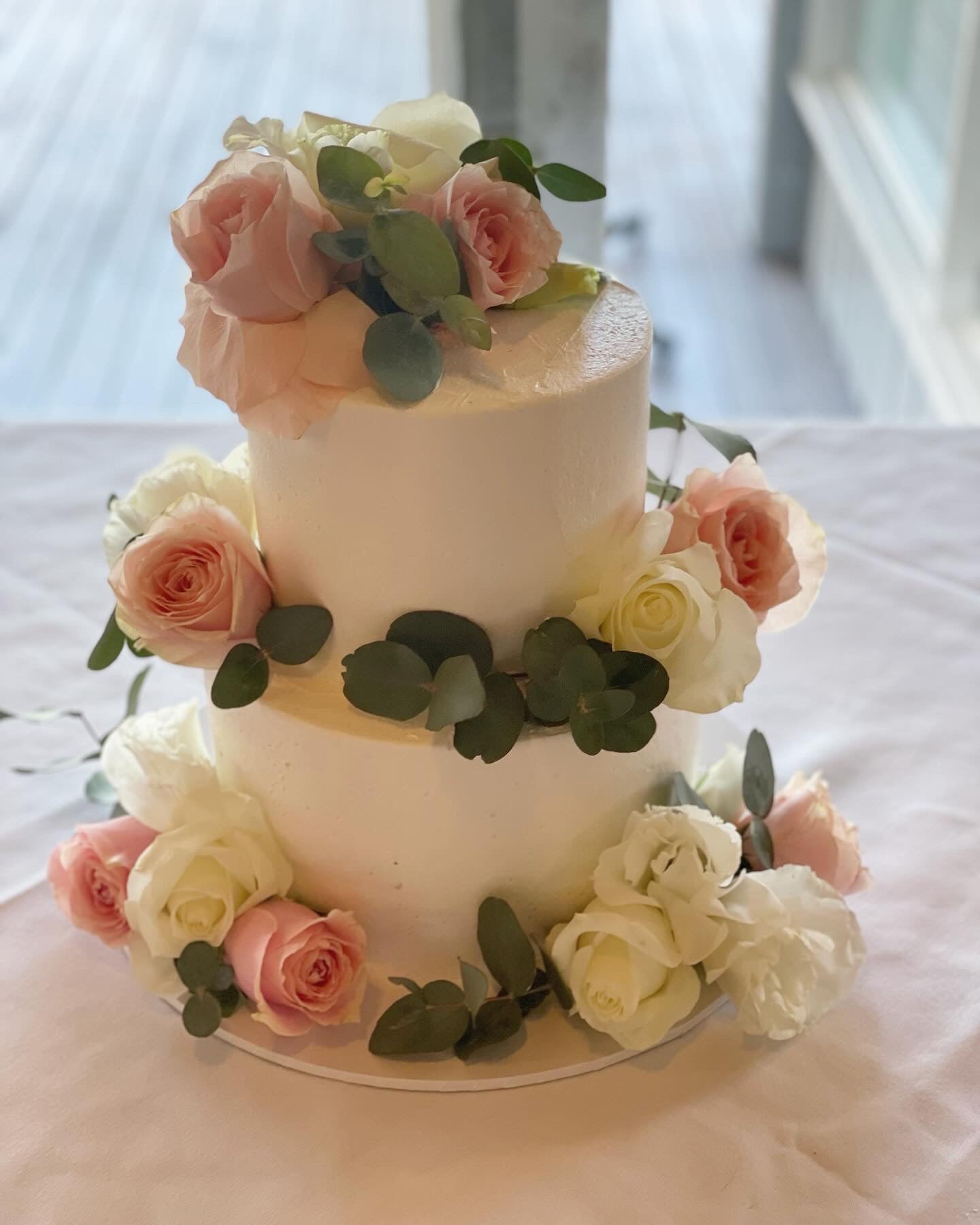 2 Tier Buttercream with Scatted flowers