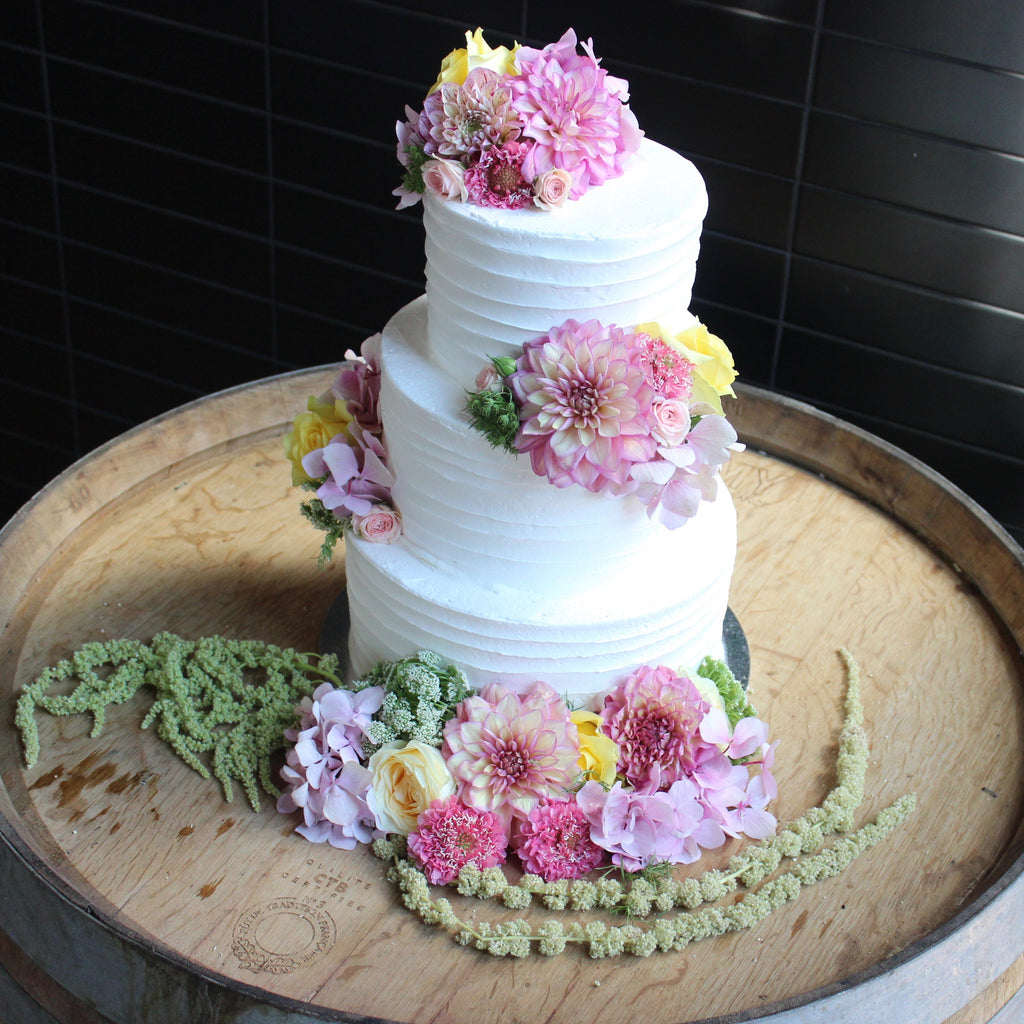 3 Tier Buttercream with Scatted flowers
