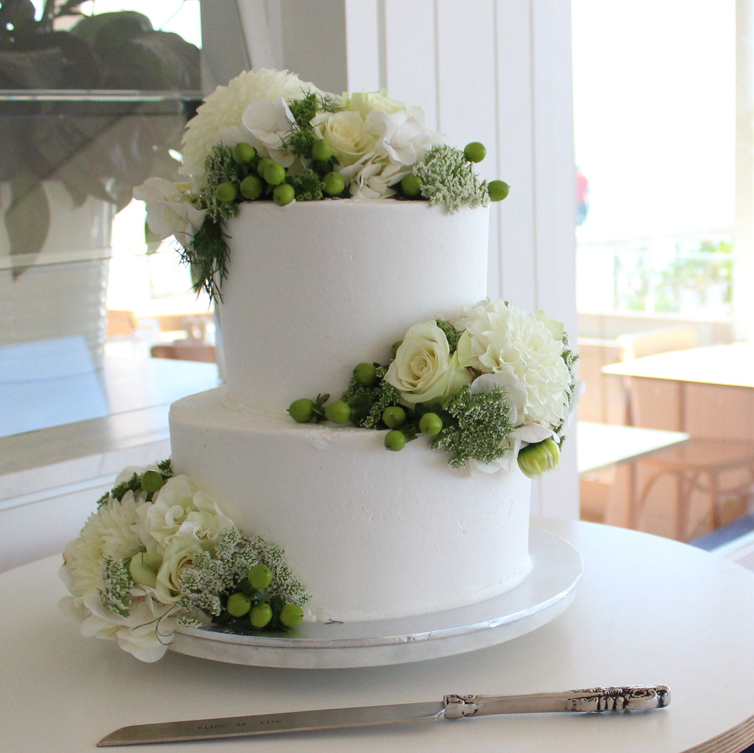 Simple white two-tier cake | Simple wedding cake, Wedding cake minimalist,  Textured wedding cakes