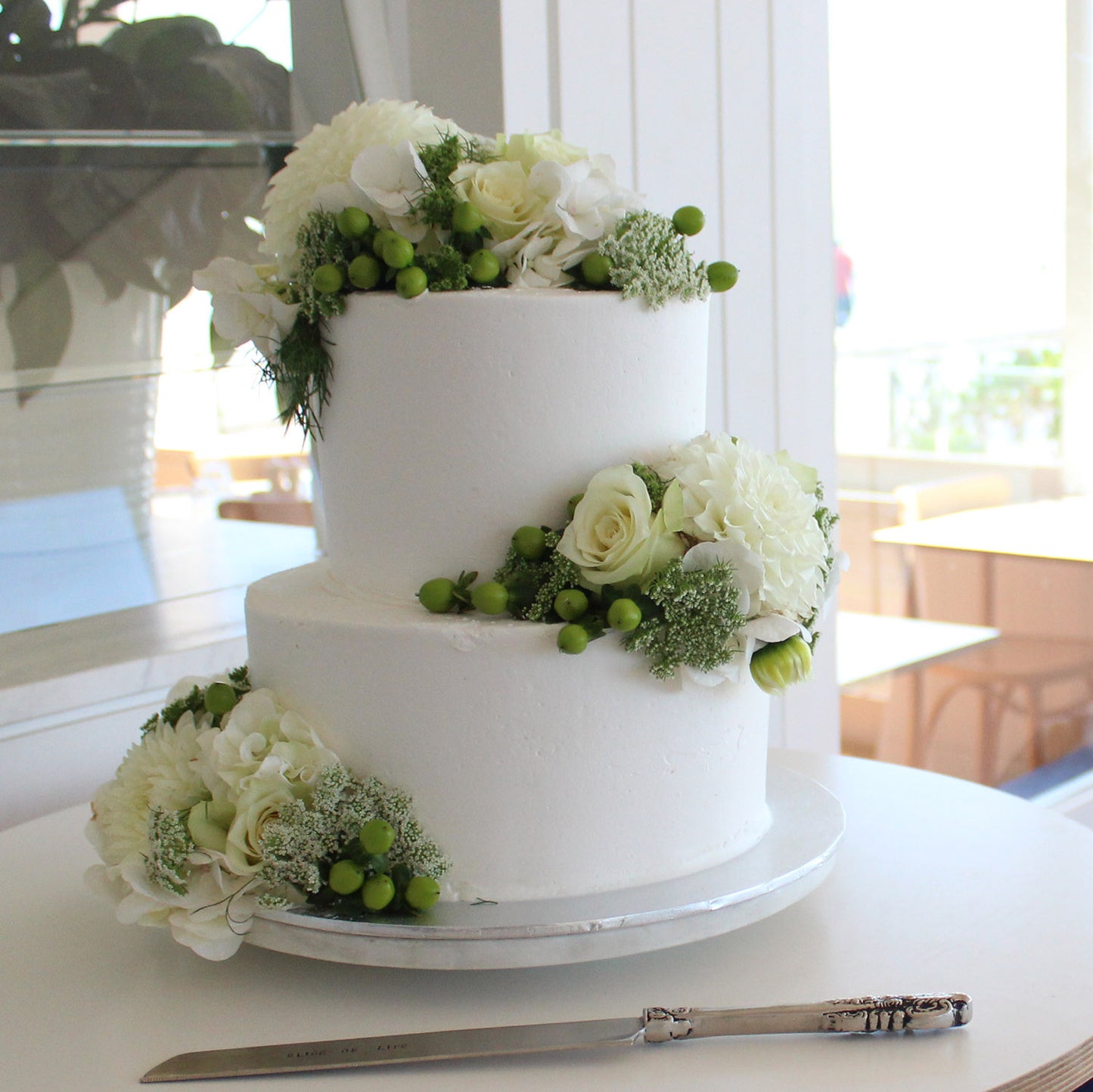 2 Tier Buttercream with Scatted flowers